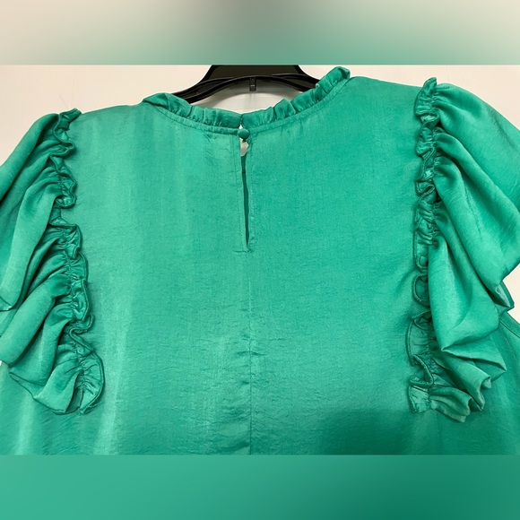 Glam green top with beautiful frill detail around neck & arms. Size L - Picture 4 of 7